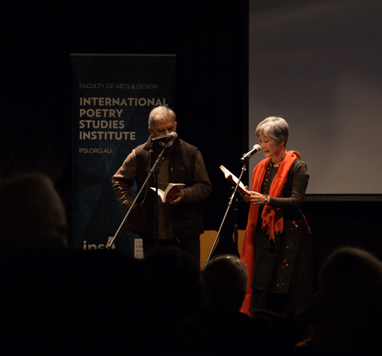 Subhash Jaireth (left) and Kayoko Yamasaki (right) reading.