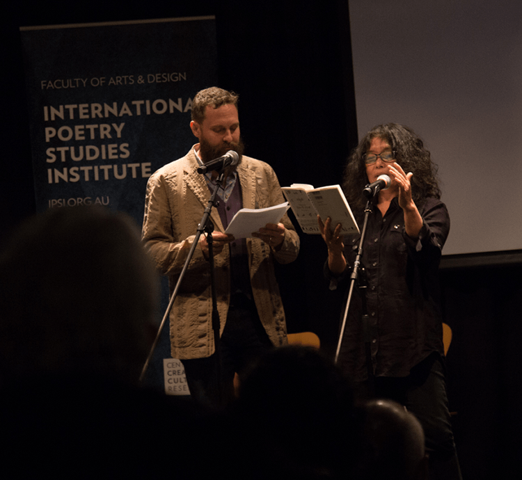 Jeffrey Angles (left) and Hiromi Ito (right) reading.